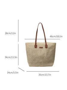 Grand sac cabas en paille tressée beige avec anses en cuir marron et dimensions affichées