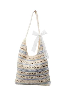 Striped crochet tote bag with lace bow detail for summer beach and vacation use