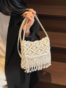 Bohemian cream macrame woven shoulder bag with long fringe tassels for beach vacation