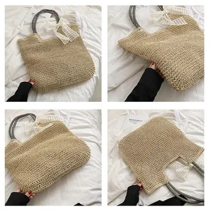 Detail of straw woven beach tote with striped handles and decorative white lace bow