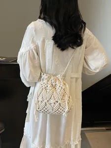 Handmade macrame bucket bag for beach vacations with boho hollow crochet texture