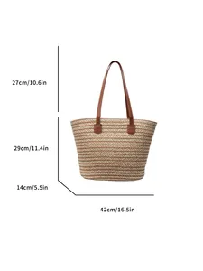 Large woven tote bag with brown leather straps for summer beach or casual daily commute