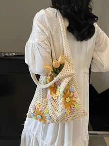 Chic beige crochet tote bag with 3D floral accents and sun pattern for beach holidays