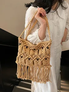 Bohemian hand-woven fringe bag with wooden beads and elegant tassels for beach vacation