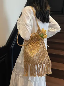 Bohemian hollow woven cotton shoulder bag with long tassels for seaside beach vacation