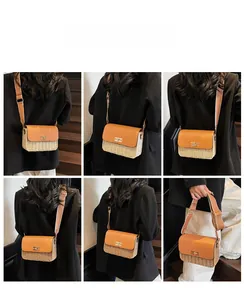 Detail showing high-quality straw weave and brown leather texture with metal lock and strap
