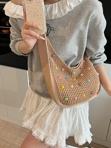 Handmade woven hobo bag with colorful pearl beads for beach vacation and casual daily style