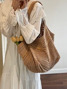 Large capacity knit tote bag in camel color with hollow crochet and wavy edges