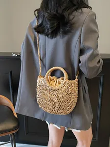 Sac en paille tissé main avec anses rondes et pochette intérieure à cordon pour la plage d'été