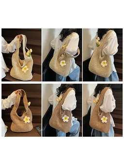 Detail shots of beige and dark brown straw tote bags with decorative white flowers
