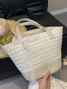 Chic beige lace woven tote bag with a large bow for summer beach vacations and holidays