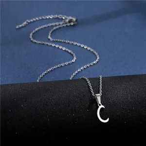 Polished stainless steel letter C pendant necklace on an elegant minimalist chain