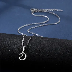 Polished silver stainless steel letter D pendant necklace on a refined link chain