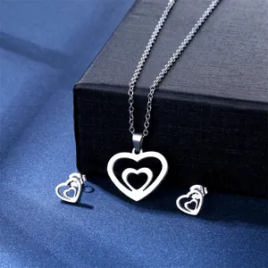 Mirror polished heart-shaped pendant necklace and earring set in silver stainless steel