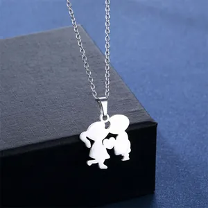 Silver stainless steel kissing boy and girl pendant necklace with a heart-shaped silhouette