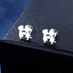 Polished stainless steel boy and girl kissing stud earrings with heart detail