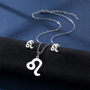 Detail view of silver Leo zodiac necklace and stud earrings set on a black display stand