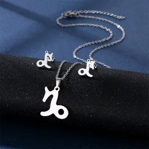 Silver Capricorn zodiac sign necklace and stud earrings set in polished stainless steel