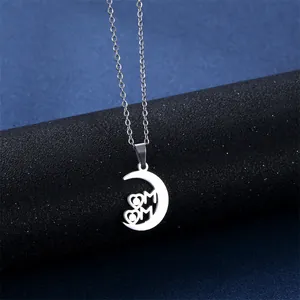 Silver crescent moon necklace with MOM lettering and hearts on stainless steel chain