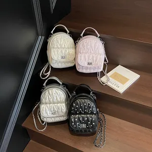 Quilted mini backpacks with rhinestones and chain straps in four assorted colors