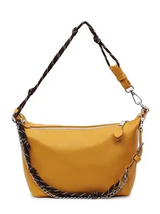 Mustard yellow half-moon crossbody bag with woven strap and silver chain detail