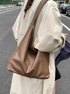 Deep brown oversized woven leather tote bag for women stylish autumn winter fashion