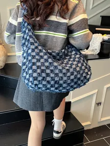 Vintage checkered denim crossbody tote bag with frayed edges in large hobo crescent shape