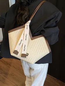 Sac fourre-tout tissé à la mode avec bordure en cuir marron et bandoulières pour le style