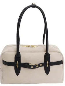 Retro cream faux suede handbag with black leather handles and gold metal accents