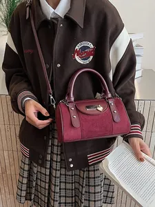 Retro burgundy Boston handbag in suede and leather with silver rivets and heart charm