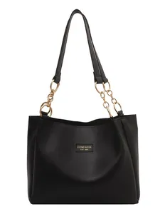 Classic black faux leather tote bag for women featuring golden chain shoulder straps