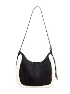 Black suede underarm bag with white faux fur trim and adjustable leather shoulder strap