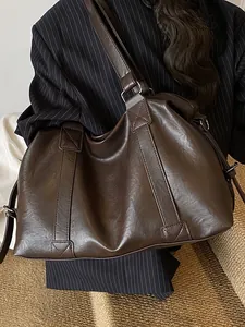 Large dark brown PU leather tote bag for women featuring reinforced shoulder straps