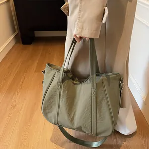 Olive green large capacity tote bag with dual handles and detachable shoulder strap