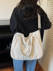 Large casual white tote bag with pleated texture and adjustable strap for women
