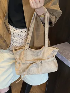 Retro faux suede large tote bag in beige with adjustable strap and metal buckle detail