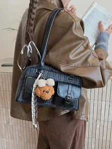 Vintage Boston bag in black leather and grey tweed with a cute teddy bear charm