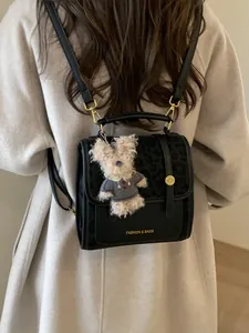 Sac à dos noir en cuir PU avec rabat léopard et pendentif chien en peluche mignon