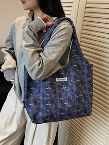 Star pattern gradient tote bag shown in a stylish shoulder-carry style for daily wear