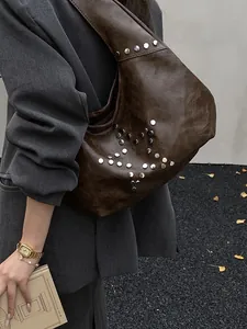 Retro dark brown PU leather underarm bag featuring silver star stud pattern decoration