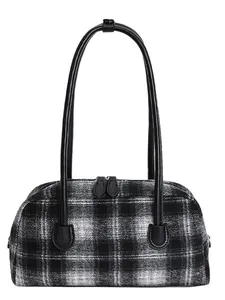 Sac à main classique à carreaux noir et blanc avec anses en cuir et fermeture zippée
