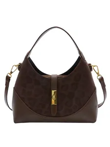 Vintage brown leopard print suede and leather dumpling shoulder bag with gold clasp