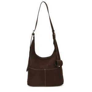 Minimalist dark brown suede tote bag with contrast stitching and adjustable strap