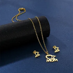 Elegant 18K gold-plated I Love Mom necklace and earrings set on dark display