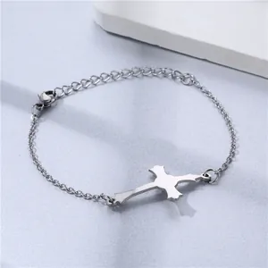 Detailed close-up of a silver stainless steel cross pendant bracelet with adjustable chain