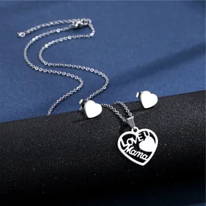 Macro detail of silver MAMA heart necklace and stud earrings set with LOVE U engraving
