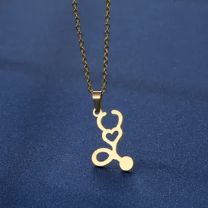 Golden stethoscope heart pendant necklace and stud earrings set on a blue background