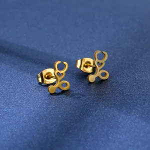 Golden stethoscope heart stud earrings set in polished stainless steel for women