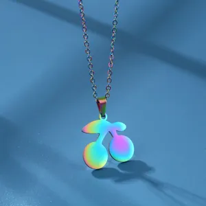 Rainbow cherry pendant necklace in titanium steel with long shadow on blue background