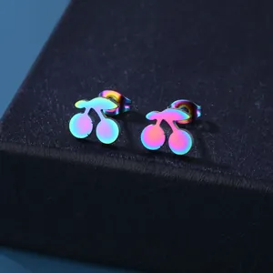 Rainbow cherry stud earrings in titanium steel displayed on a blue jewelry box